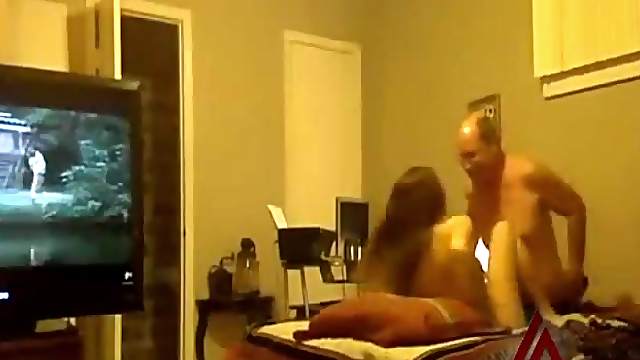 Older guy fucks the cute young lady with TV on