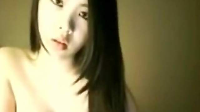 Asian camgirl has her beautiful tits out