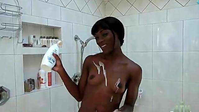 Black girl pisses and showers in the bathroom