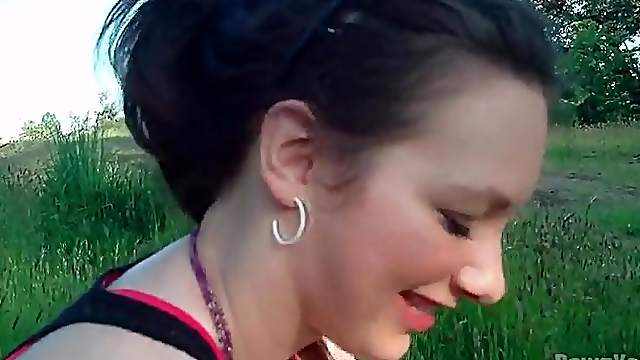 Blowjob in a grassy field from cute GF