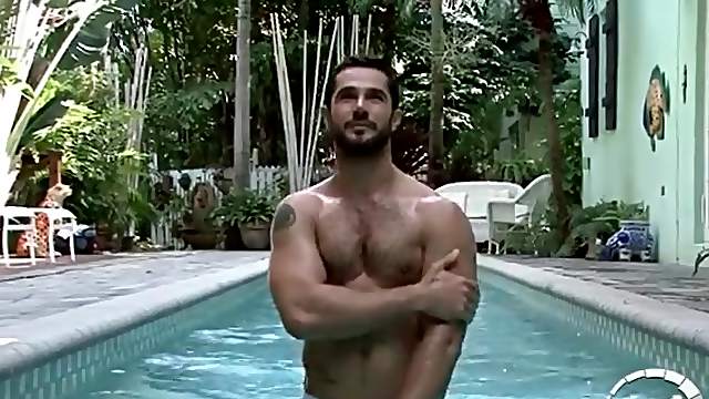 Hot bearded guy in the pool and shower