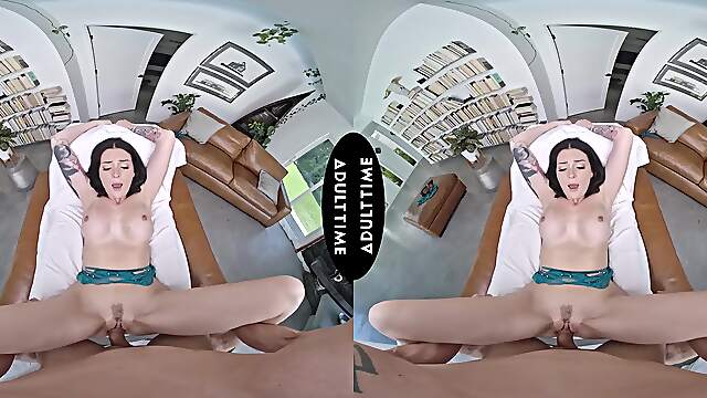 Nathan Bronson and Charlotte Sins enjoy passionate and intense sex on the sofa in vr