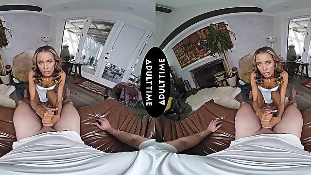 Kylie Le Beau rides a big cock in vr with intense passion on the sofa.