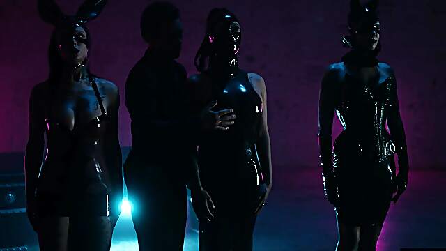 Small Hands and Joanna Angel share a steamy, latex-wearing threesome with Evelyn Claire.