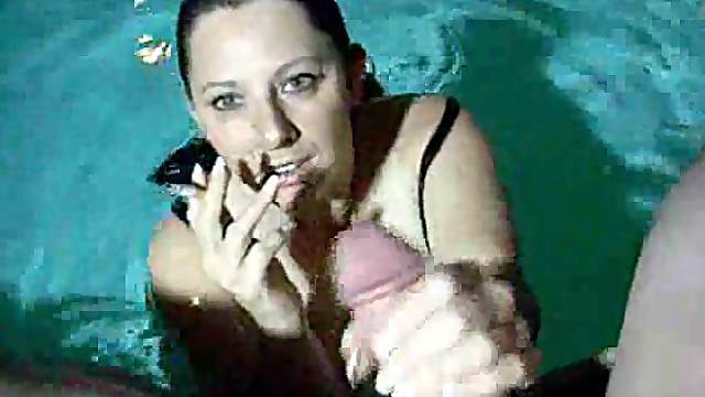 Big tits amateur in the pool sucking cock